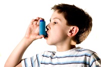 boy with asthma inhaler