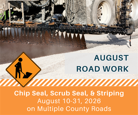 Chip seal being applied to road surface